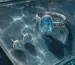 Natural blue gemstone ring and earrings in sterling silver under water-reflected light